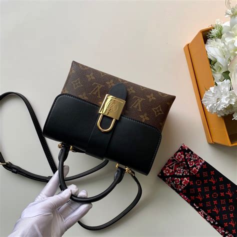 black louis vuitton bag wood handles